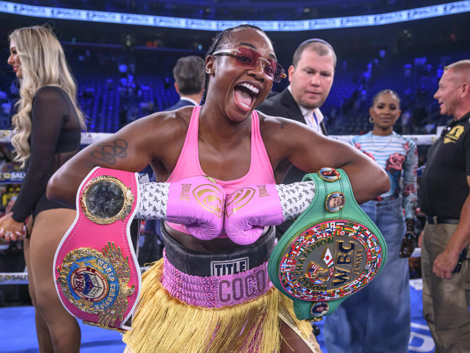 DETROIT, MICHIGAN - JULY 27:  Claressa Shields, poses with the  WBC Elizabethan Belt and the WBO World Lightweight and Heavyweight Title belts after a second-round KO over Vanessa Lepage-Joanisse at Little Caesars Arena on July 27, 2024, in Detroit, Michigan. (Photo by Terrell Groggins/Getty Images)