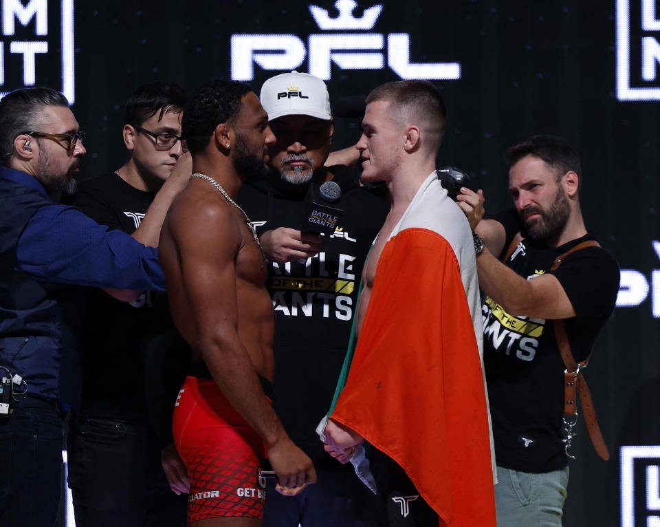 Mixed Martial Arts - Professional Fighters League Fight Night - Saudi Arabia - Weigh-In - Riyadh, Saudi Arabia - October 18, 2024 A.J. McKee and Paul Hughes go head to head during the weigh-in before their lightweight fight REUTERS/Hamad I Mohammed