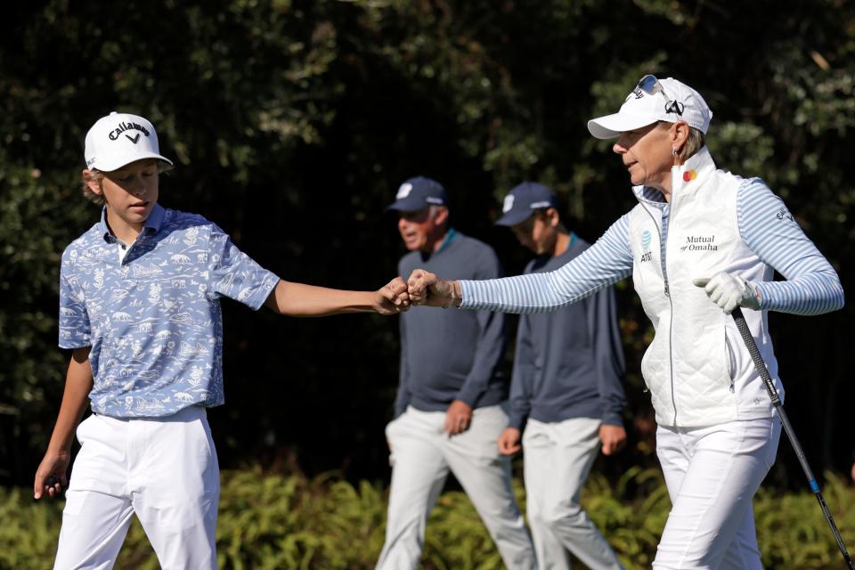 Annika Sorenstam and son Will McGee react as they walk from the tee during the second round of the 2024 ...