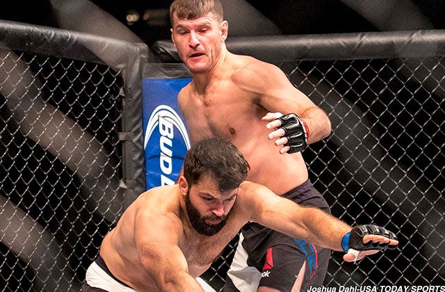 Jan 2, 2016; Las Vegas, NV, USA; Stipe Miocic (red gloves) competes against Andrei Arlovski (blue gloves) during UFC 195 at MGM Grand Garden Arena. Mandatory Credit: Joshua Dahl-USA TODAY Sports