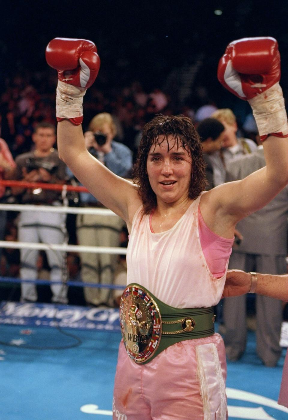 16 Mar 1996:  Christy Martin celebrates during a bout against Deidre Gogarty in Las Vegas, Nevada.  Martin won the fight with a decision in the sixth round. Mandatory Credit: Al Bello  /Allsport