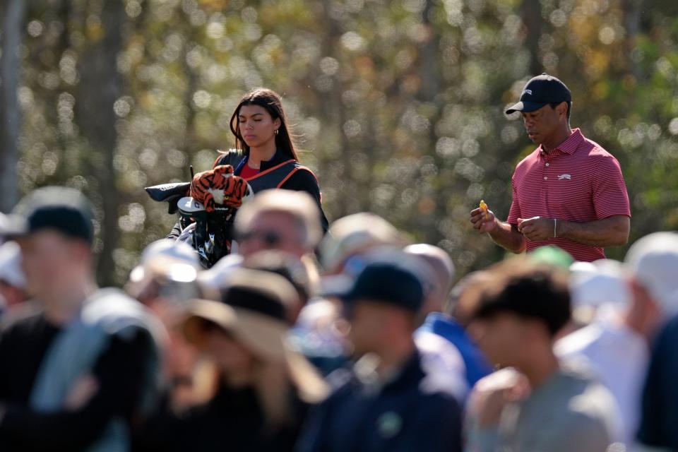 Tiger Woods walks with his daughter Sam Woods on the eighth hole during the second round of the 2024 PNC Championship at Ritz-Carlton Golf Club in Orlando, Florida.