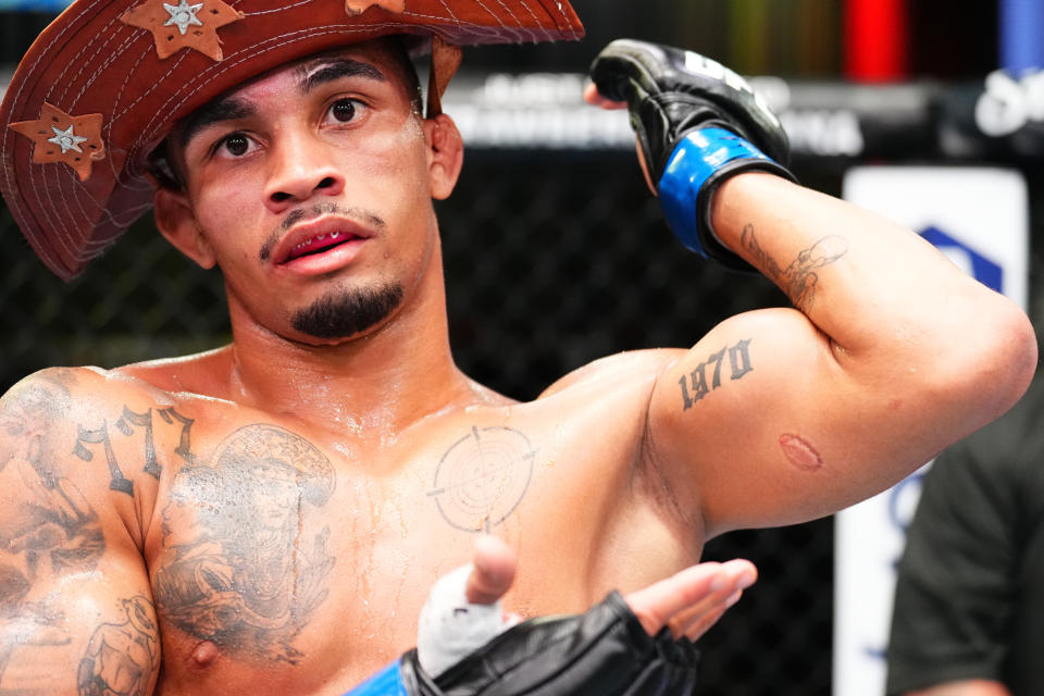 LAS VEGAS, NEVADA - MARCH 23:  Andre Lima of Brazil shows a bite mark on his arm after his flyweight fight against Igor Severino of Brazil during the UFC Fight Night event at UFC APEX on March 23, 2024 in Las Vegas, Nevada.  Severino was disqualified for biting Lima in the second round. (Photo by Chris Unger/Zuffa LLC via Getty Images)