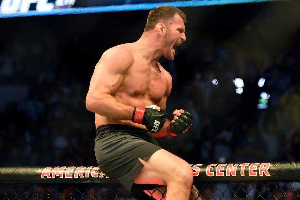 May 13, 2017; Dallas, TX, USA; Stipe Miocic (red gloves) defeats Junior Dos Santos (blue gloves) during UFC 211 at American Airlines Center. Mandatory Credit: Jerome Miron-USA TODAY Sports