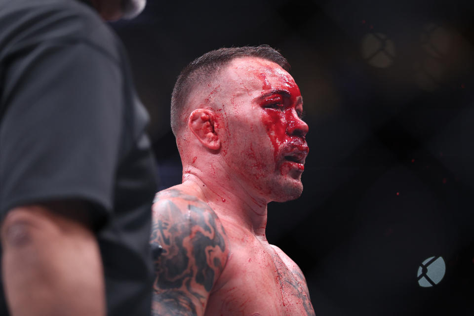 Dec 14, 2024; Tampa, Florida, UNITED STATES;  Colby Covington (red gloves) reacts after the fight against Joaquin Buckley (blue gloves) at Amalie Arena. Mandatory Credit: Nathan Ray Seebeck-Imagn Images