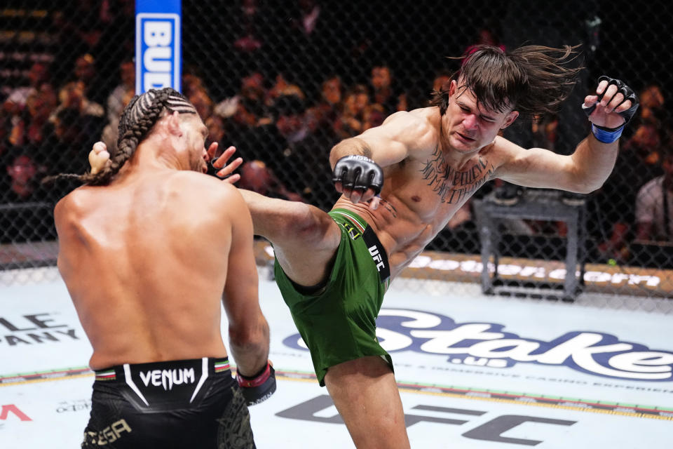 LAS VEGAS, NEVADA - SEPTEMBER 14: (R-L) Diego Lopes of Brazil kicks Brian Ortega in a featherweight fight during the UFC 306 at Riyadh Season Noche UFC event at Sphere on September 14, 2024 in Las Vegas, Nevada. (Photo by Jeff Bottari/Zuffa LLC)