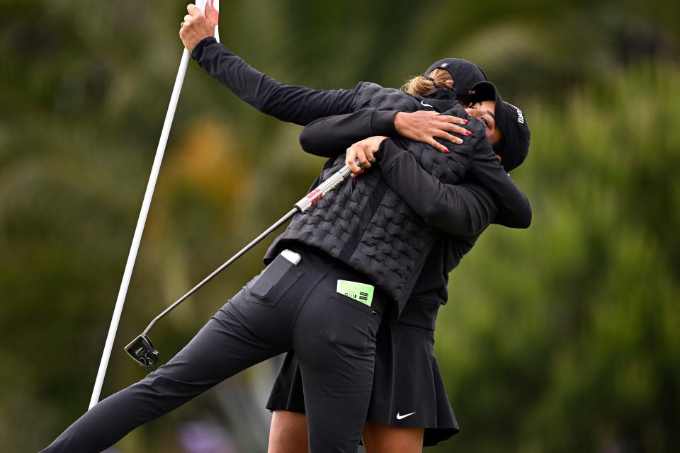 Megha Ganne of the Stanford Cardinal, right, is congratulated by head coach Anne Walker after winning her match during the NCAA Women's Golf Division I Championships at Omni La Costa Resort & Spa on May 22, 2024 in Carlsbad, California. (Photo by Orlando Ramirez/Getty Images)