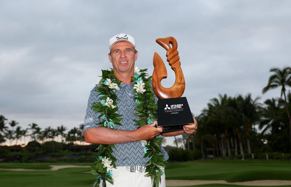 Steven Alker poses with the trophy after winning the PGA Tour Champions Mitsubishi Electric Championship 2024 at Hualalai Golf Club in Kailua Kona, Hawaii.