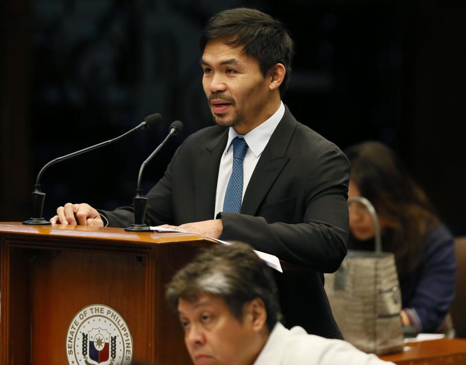 Manny Pacquiao delivers a speech during a session of the Philippine Senate in August 2016.