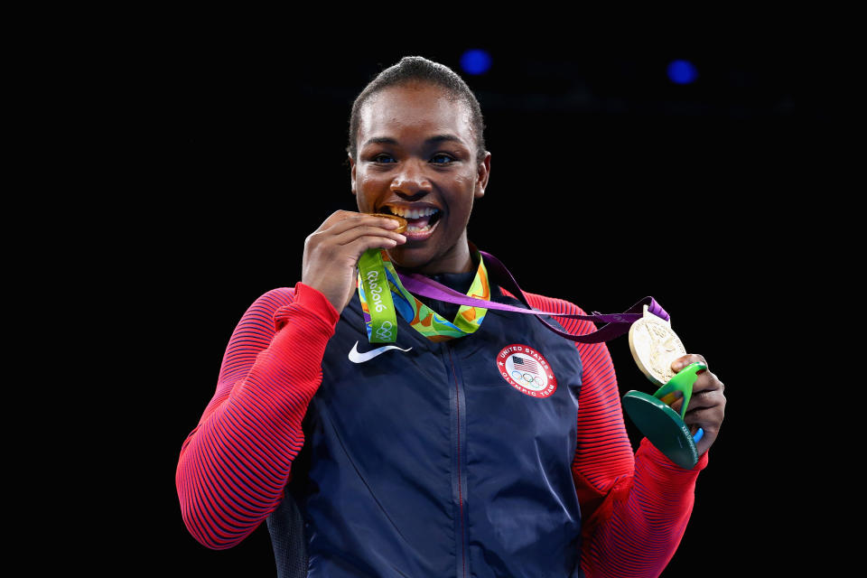 RIO DE JANEIRO, BRAZIL - AUGUST 21:  Gold medalist Claressa Maria Shields of the United States poses on the podium during the medal ceremony for the Women's Boxing Middle (69-75kg) on Day 16 of the Rio 2016 Olympic Games at Riocentro - Pavilion 6 on August 21, 2016 in Rio de Janeiro, Brazil.  (Photo by Alex Livesey/Getty Images)