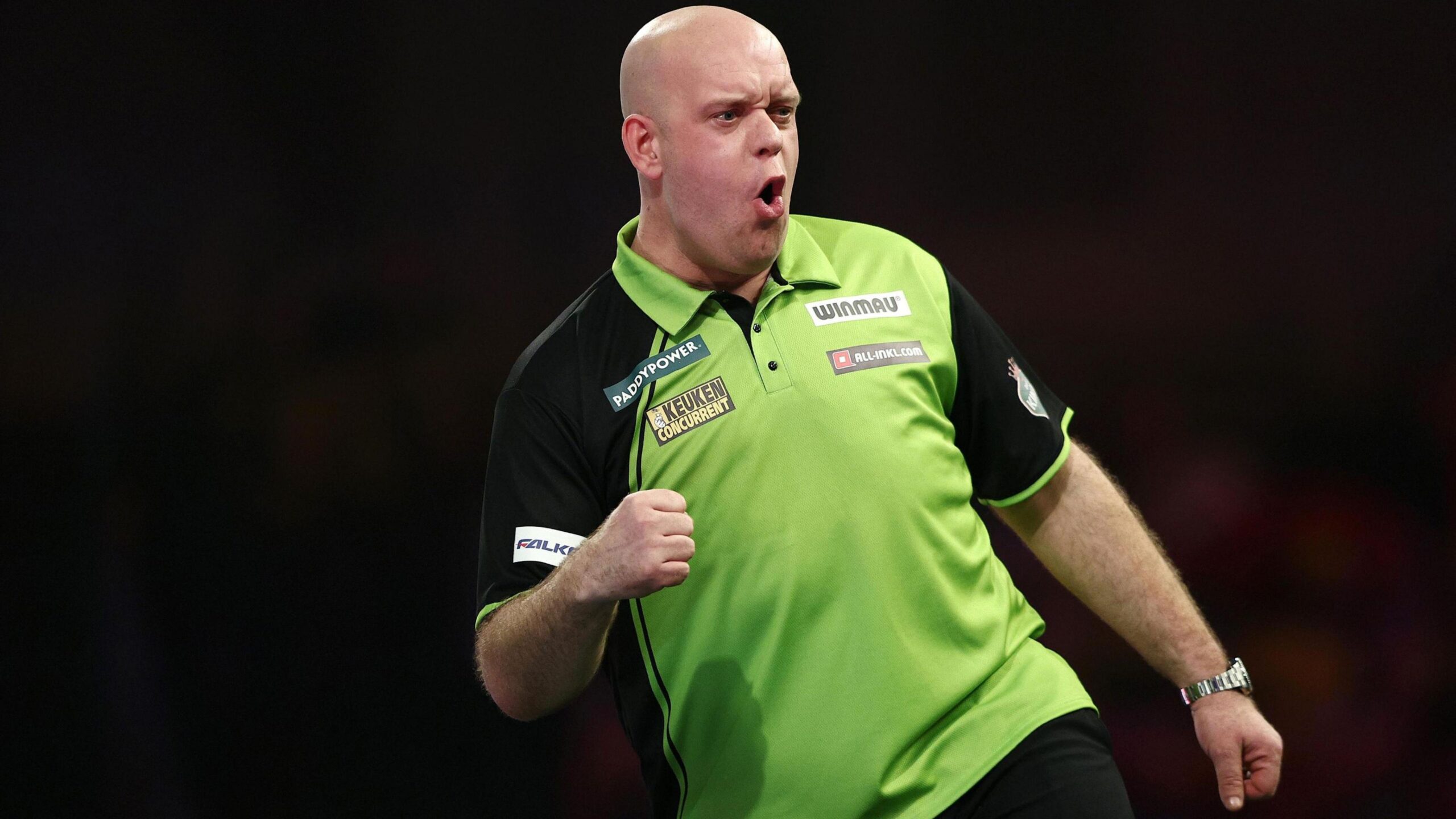 Michael van Gerwen celebrates against Brendan Dolan in the PDC World Darts Championship third round