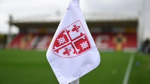 Getty Images A detailed view of a corner flag prior to the Emirates FA Cup First Round match between Woking and Cambridge Utd at Kingfield Stadium