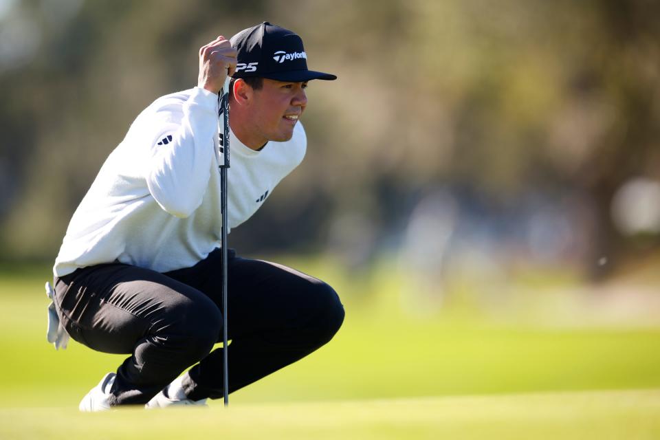 Michael Thorbjornsen lines up a putt on the first green during the second round of The RSM Classic 2024 on the Seaside course at Sea Island Resort.