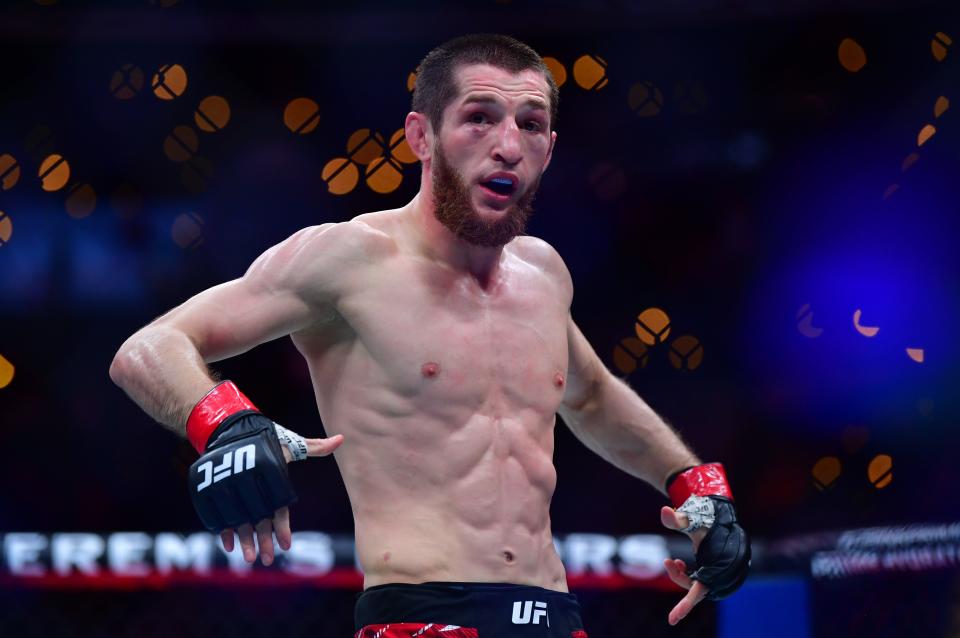 Jan 18, 2025; Inglewood, California, USA; Tagir Ulanbekov (red gloves) celebrates after defeating Clayton Carpenter (not pictured) during UFC 311 at Intuit Dome. Mandatory Credit: Gary A. Vasquez-Imagn Images