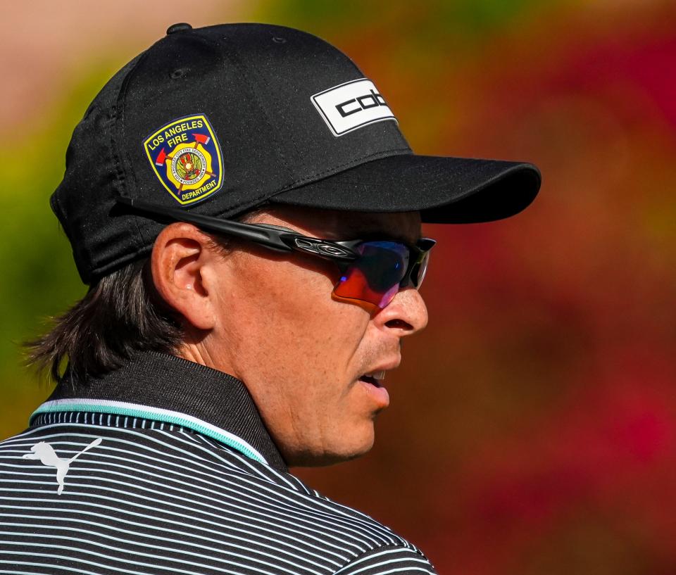 Rickie Fowler wears a Los Angeles Fire Department patch on his hat as he gets ready to tee off on 11 during the second round of The American Express on the Nicklaus Tournament Course at PGA West in La Quinta, Calif., Friday, Jan. 17, 2025.