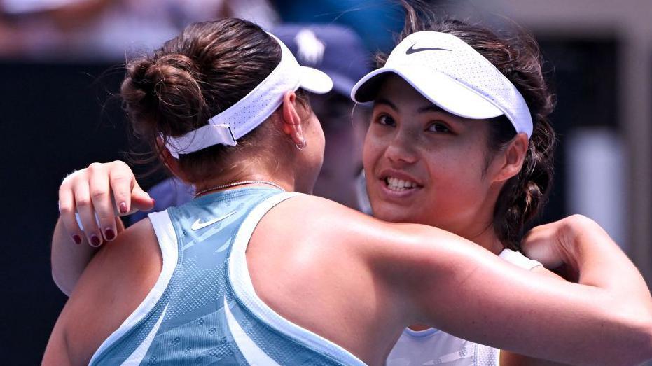 Emma Raducanu hugs Amanda Anisimova after their Australian Open match