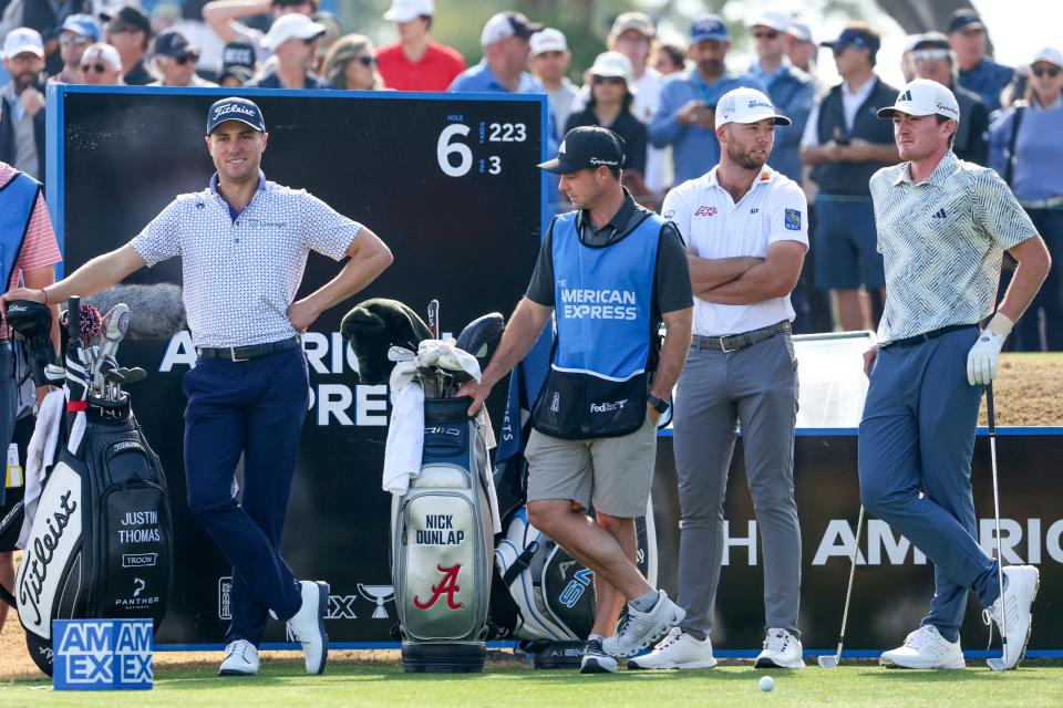 Justin Thomas, left, Sam Burns and Nick Dunlap wait to tee off on the 6th hole of the Pete Dye Stadium Course at PGA West during The American Express final round in La Quinta, Calif., on Sunday, January 21, 2024.