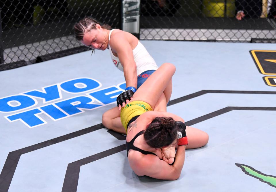 LAS VEGAS, NEVADA - MAY 30: Mackenzie Dern secures a knee bar submission against Hannah Cifers in their strawweight fight during the UFC Fight Night event at UFC APEX on May 30, 2020 in Las Vegas, Nevada. (Photo by Jeff Bottari/Zuffa LLC)