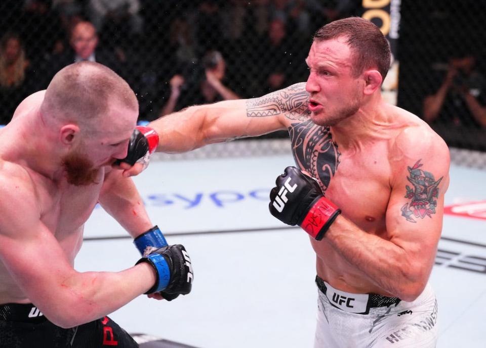 LAS VEGAS, NEVADA - FEBRUARY 10: (R-L) Jack Hermansson of Sweden punches Joe Pyfer in a middleweight fight during the UFC Fight Night event at UFC APEX on February 10, 2024 in Las Vegas, Nevada. (Photo by Jeff Bottari/Zuffa LLC via Getty Images)