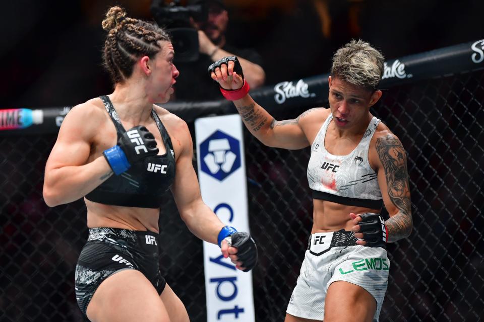 Feb 17, 2024; Anaheim, California, USA; Mackenzie Dern lands a hit against Amanda Lemos during UFC 298 at Honda Center. Mandatory Credit: Gary A. Vasquez-USA TODAY Sports