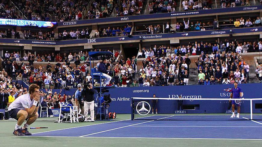 Andy Murray covers his face with his hands after winning the US Open in 2012