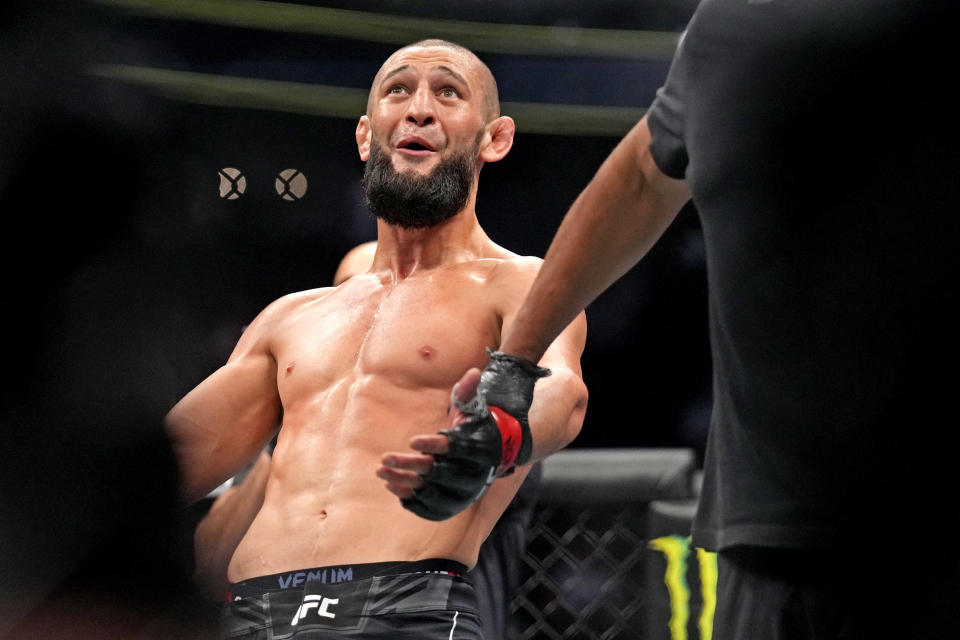 Sep 10, 2022; Las Vegas, Nevada, USA; Khamzat Chimaev (red gloves) fights Kevin Holland (blue gloves) during UFC 279 at T-Mobile Arena. Mandatory Credit: Joe Camporeale-USA TODAY Sports