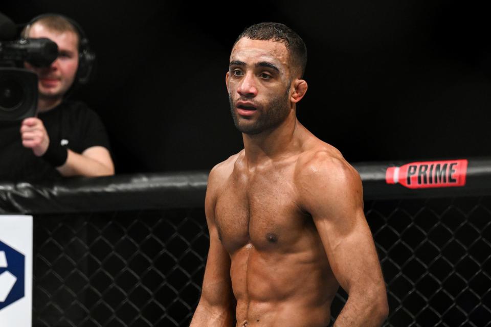 Mar 18, 2023; London, UNITED KINGDOM; Jai Herbert (red gloves) fights Ludovit Klein (not pictured) during UFC 286 at O2 Arena. Mandatory Credit: Per Haljestam-USA TODAY Sports