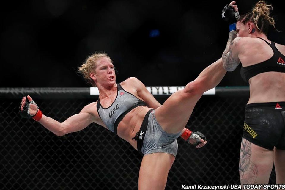 Jun 9, 2018; Chicago, IL, USA;  Holly Holm (red gloves) fights Megan Anderson (blue gloves) during UFC 225 at United Center. Mandatory Credit: Kamil Krzaczynski-USA TODAY Sports