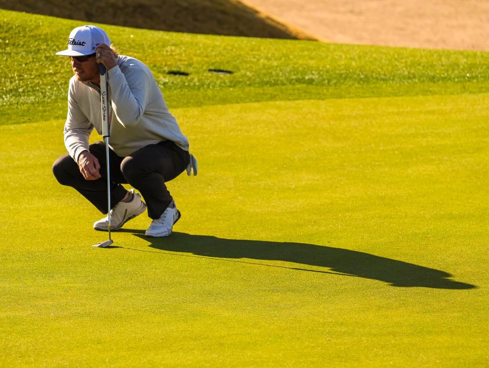 Charley Hoffman lines up his putt on the Pete Dye Stadium Course during the third round of The American Express at PGA West in La Quinta, Calif., Saturday, Jan. 18, 2025.