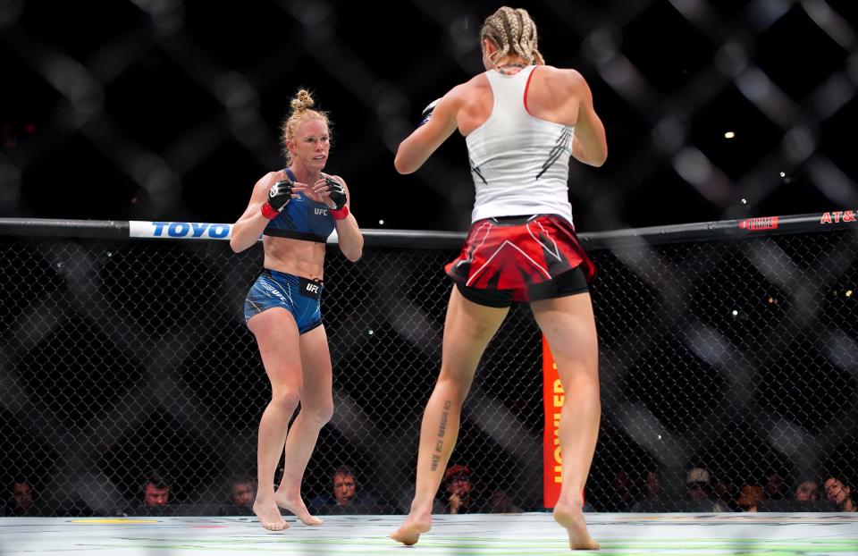 Mar 25, 2023; San Antonio, Texas, USA; Holly Holm (red gloves) fights Yana Santos (blue gloves) during UFC Fight Night at AT&T Center. Mandatory Credit: Aaron Meullion-USA TODAY Sports