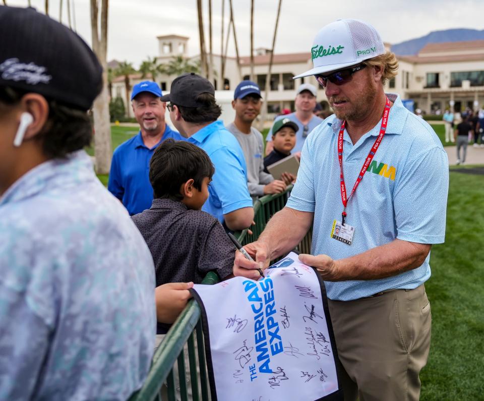 Charley Hoffman signs autographs for fans during the first round of The American Express at La Quinta Country Club in La Quinta, Calif., Thursday, Jan. 16, 2025.