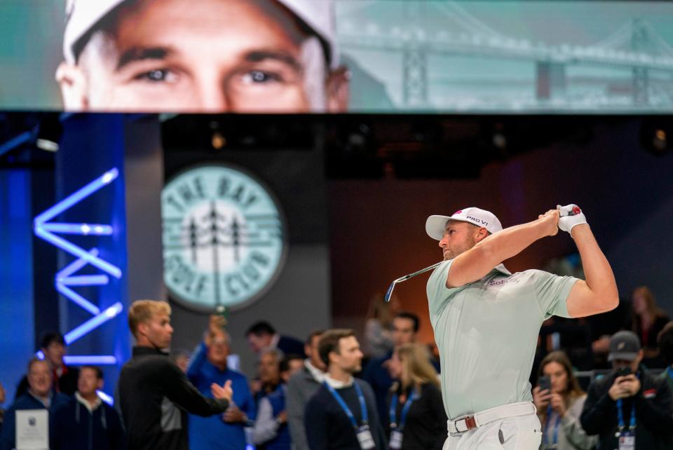 Golfer practices during the inaugural golf match at SoFi Center, the home of TGL, the interactive golf league founded by Tiger Woods and Rory McIlroy on January 7, 2025 in Palm Beach Gardens, Florida.