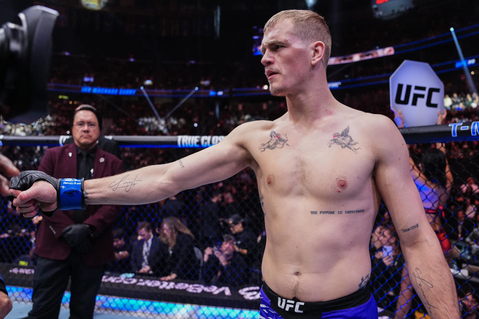 LAS VEGAS, NEVADA - DECEMBER 07: Ian Machado Garry of Ireland looks on before a welterweight bout against Shavkat Rakhmonov of Uzbekistan during the UFC 310 event at T-Mobile Arena on December 07, 2024 in Las Vegas, Nevada. (Photo by Jeff Bottari/Zuffa LLC)