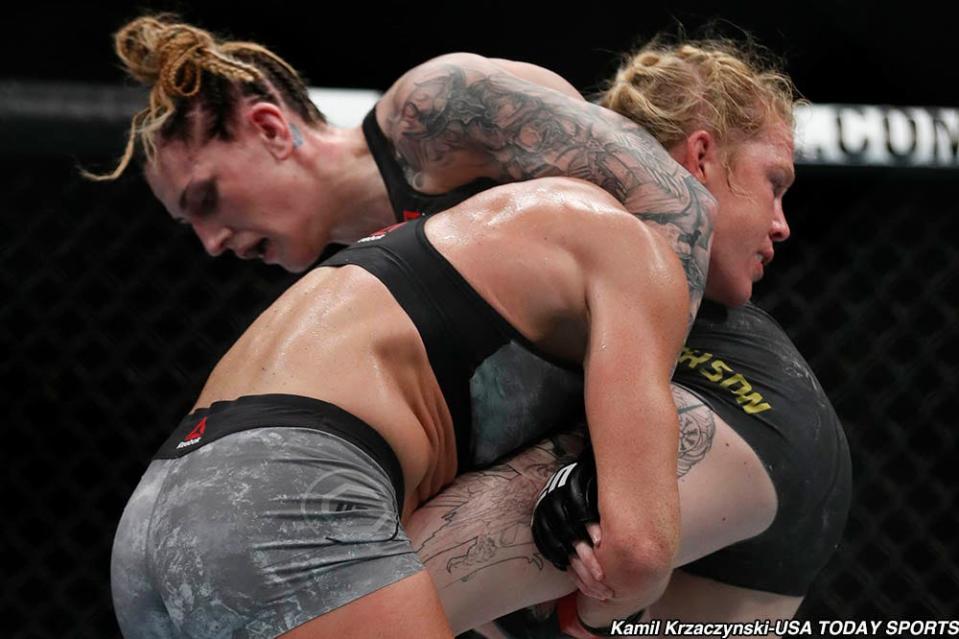 Jun 9, 2018; Chicago, IL, USA;  Holly Holm (red gloves) fights Megan Anderson (blue gloves) during UFC 225 at United Center. Mandatory Credit: Kamil Krzaczynski-USA TODAY Sports