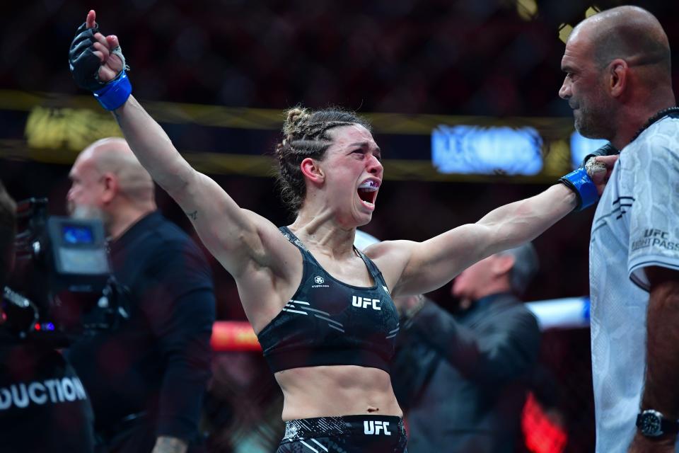 Feb 17, 2024; Anaheim, California, USA; Mackenzie Dern celebrates her victory by decision against Amanda Lemos during UFC 298 at Honda Center. Mandatory Credit: Gary A. Vasquez-USA TODAY Sports