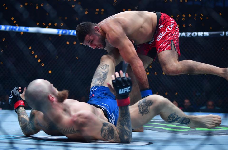 Jan 18, 2025; Inglewood, California, USA; Zachary Reese (red gloves) fights Azamat Bekoev (blue gloves) during UFC 311 at Intuit Dome. Mandatory Credit: Gary A. Vasquez-Imagn Images