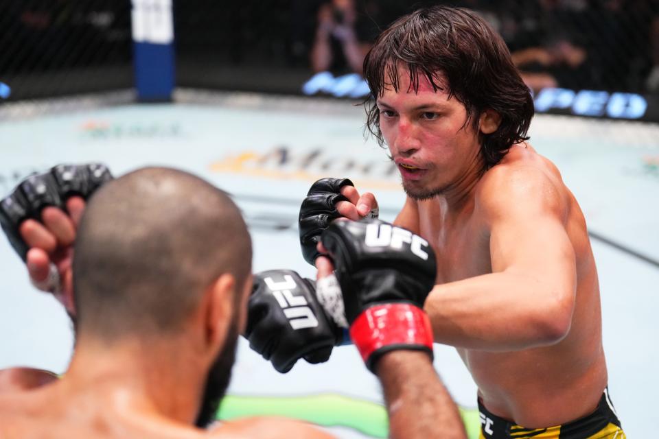 LAS VEGAS, NEVADA - JULY 09: (R-L) Ricky Turcios punches Aiemann Zahabi of Canada in their bantamweight fight during the UFC Fight Night event at UFC APEX on July 09, 2022 in Las Vegas, Nevada. (Photo by Chris Unger/Zuffa LLC)