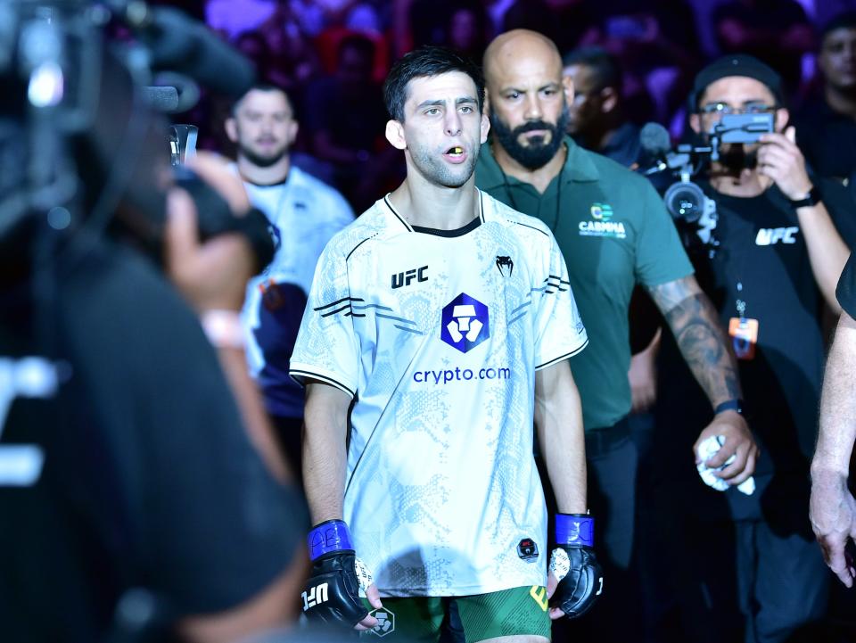 May 4, 2024; Rio de Janeiro, RJ, BRAZIL; Alexandre Pantoja (red gloves) fights against Steve Erceg (blue gloves) during UFC 301 at Rio Arena. Mandatory Credit: Jason Silva-USA TODAY Sports