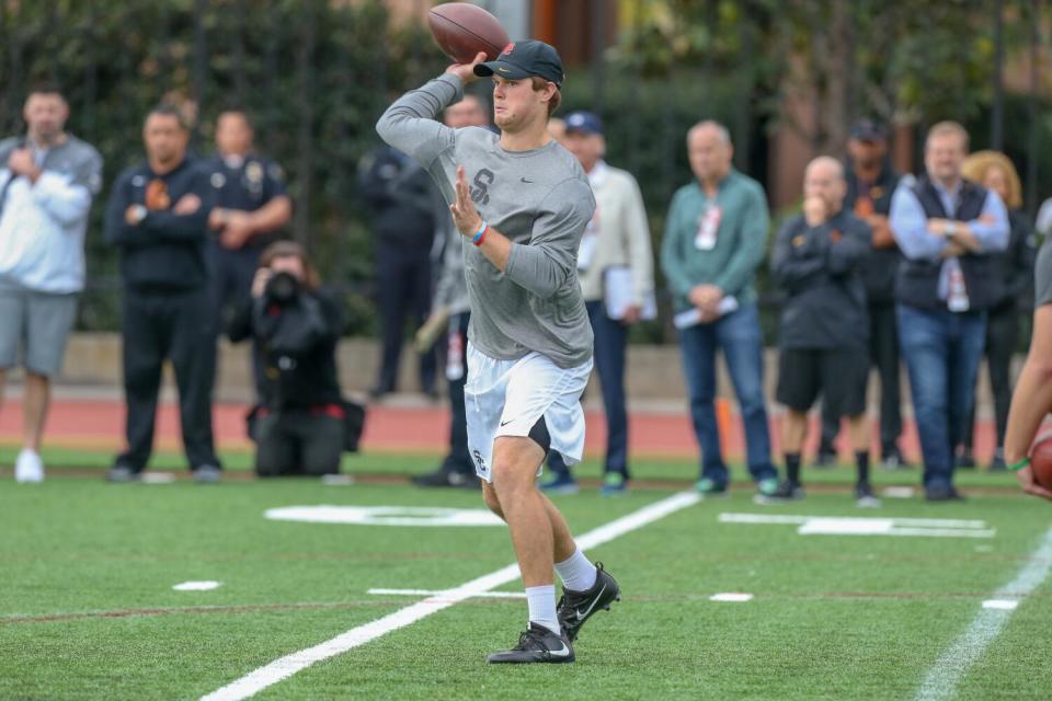 Sam Darnold performs drills in front of NFL scouts during USC Trojans Pro day on March 21, 2018.