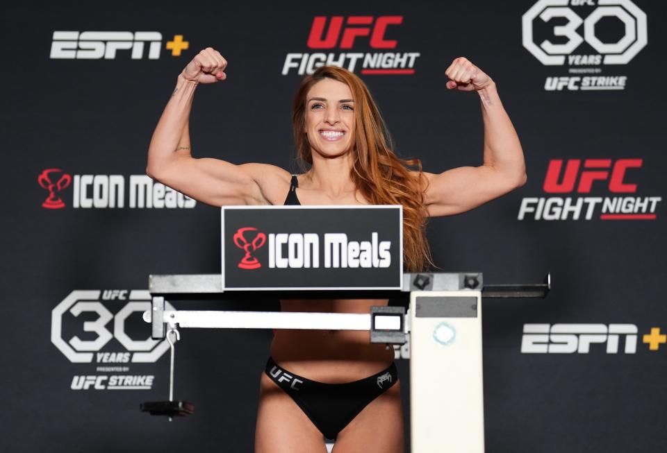 LAS VEGAS, NEVADA - MAY 19: Mackenzie Dern poses on the scale during the UFC weigh-in at Santa Fe Station Hotel and Casino on May 19, 2023 in Las Vegas, Nevada. (Photo by Chris Unger/Zuffa LLC via Getty Images)