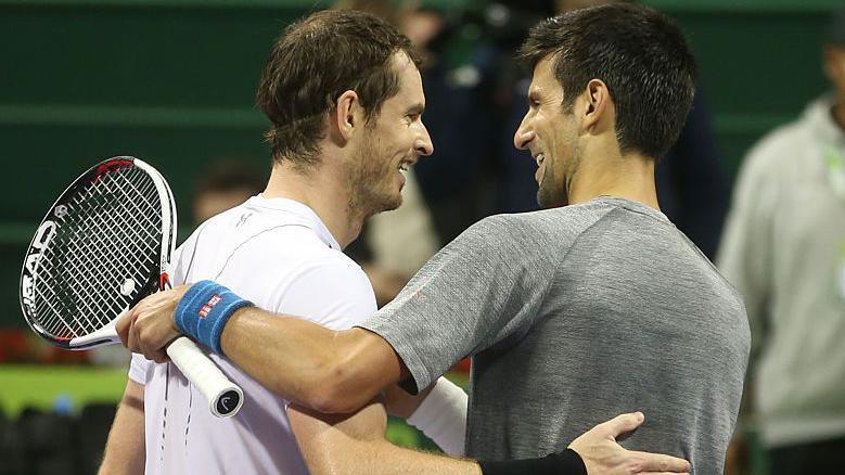 Andy Murray and Novak Djokovic embrace at the net after the 2017 Qatar Open final