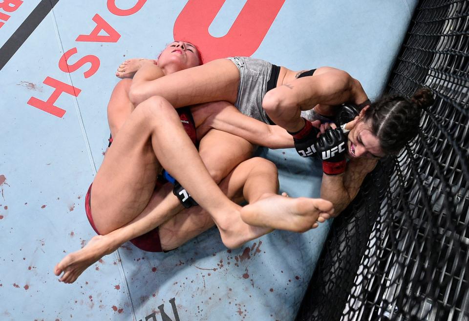 LAS VEGAS, NEVADA - SEPTEMBER 19: (R-L) Mackenzie Dern secures an arm bar submission against Randa Markos of Iraq in their strawweight bout during the UFC Fight Night event at UFC APEX on September 19, 2020 in Las Vegas, Nevada. (Photo by Chris Unger/Zuffa LLC)