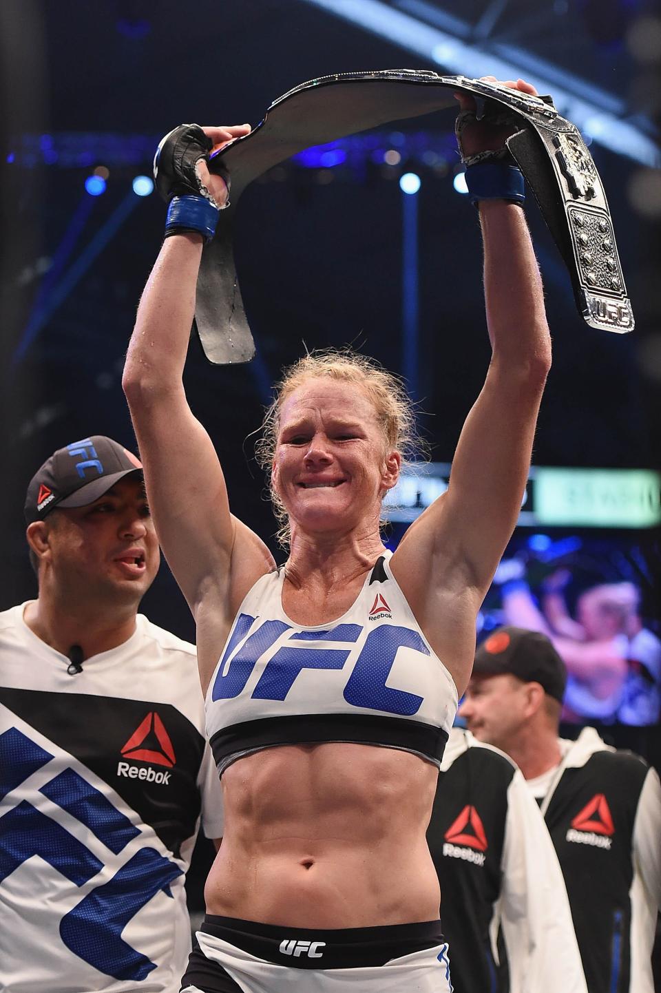 Nov 15, 2015; Melbourne, Australia; Holly Holm (blue gloves) celebrates after defeating Ronda Rousey (not pictured) during UFC 193 at Etihad Stadium. Mandatory Credit: Matt Roberts-USA TODAY Sports