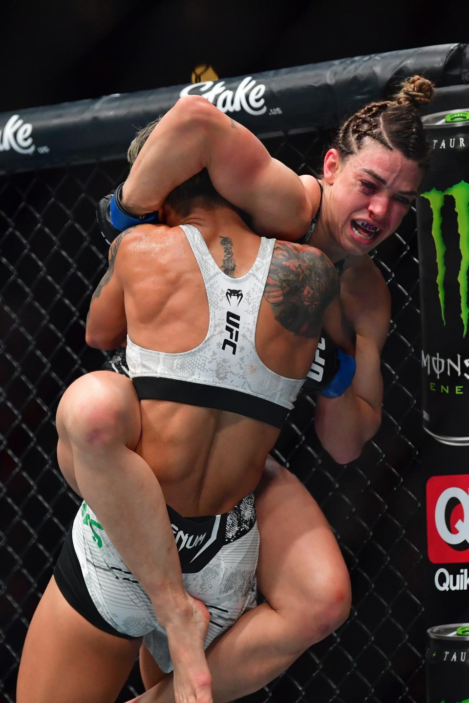 Feb 17, 2024; Anaheim, California, USA; Amanda Lemos pins Mackenzie Dern to the cage during UFC 298 at Honda Center. Mandatory Credit: Gary A. Vasquez-USA TODAY Sports