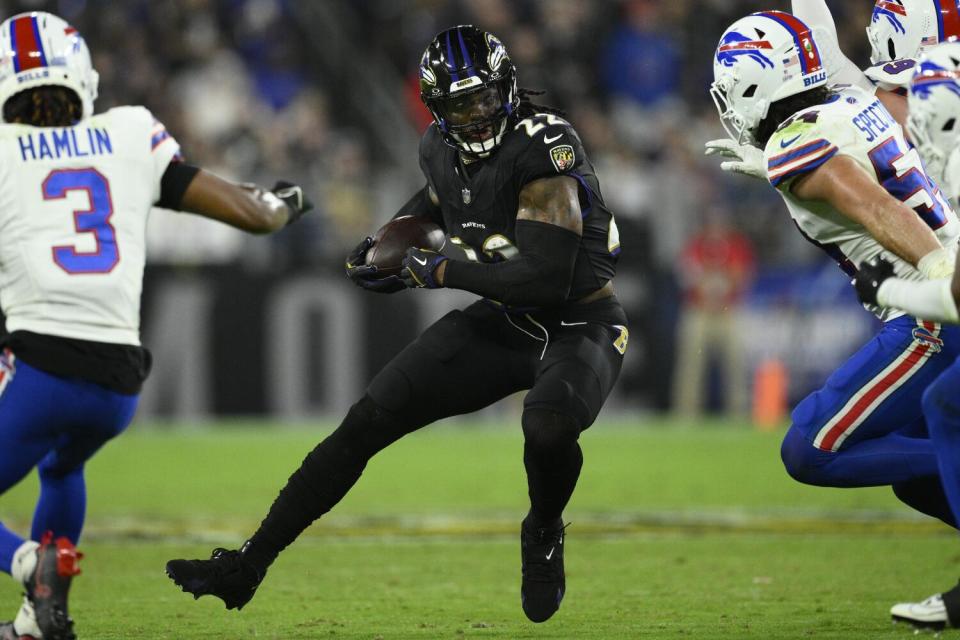 Ravens running back Derrick Henry (22) runs against the Bills in September.