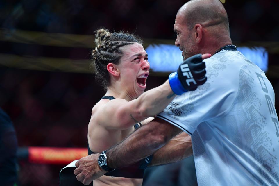 Feb 17, 2024; Anaheim, California, USA; Mackenzie Dern celebrates her victory by decision against Amanda Lemos during UFC 298 at Honda Center. Mandatory Credit: Gary A. Vasquez-USA TODAY Sports