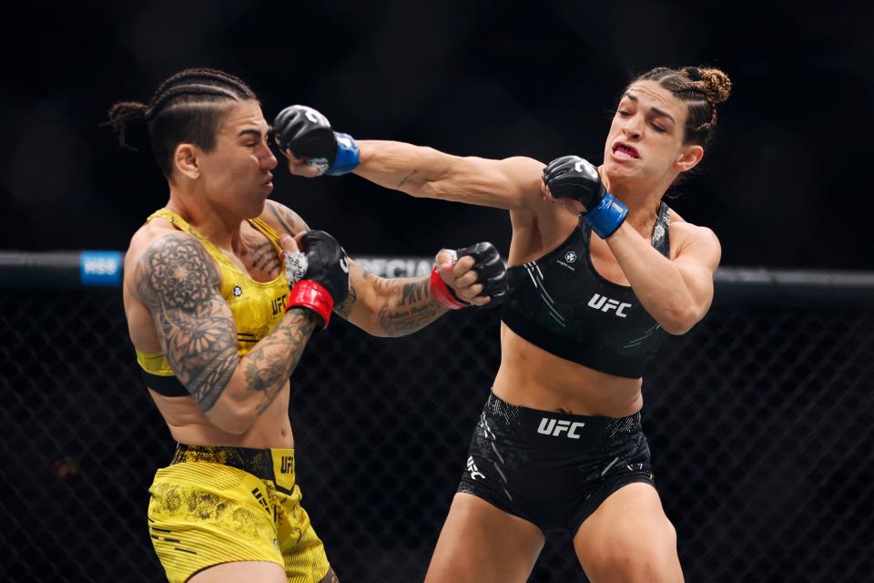 NEW YORK, NEW YORK - NOVEMBER 11: Mackenzie Dern punches Jessica Andrade of Brazil in a strawweight fight during the UFC 295 event at Madison Square Garden on November 11, 2023 in New York City. (Photo by Sarah Stier/Getty Images)