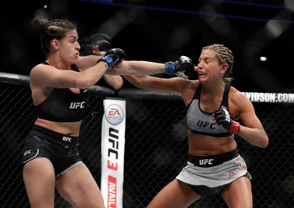 LAS VEGAS, NV - MARCH 03:  Ashley Yoder (R) and Mackenzie Dern trade punches during their women's strawweight bout during UFC 222 at T-Mobile Arena on March 3, 2018 in Las Vegas, Nevada.  Dern won by split decision.  (Photo by Isaac Brekken/Getty Images)