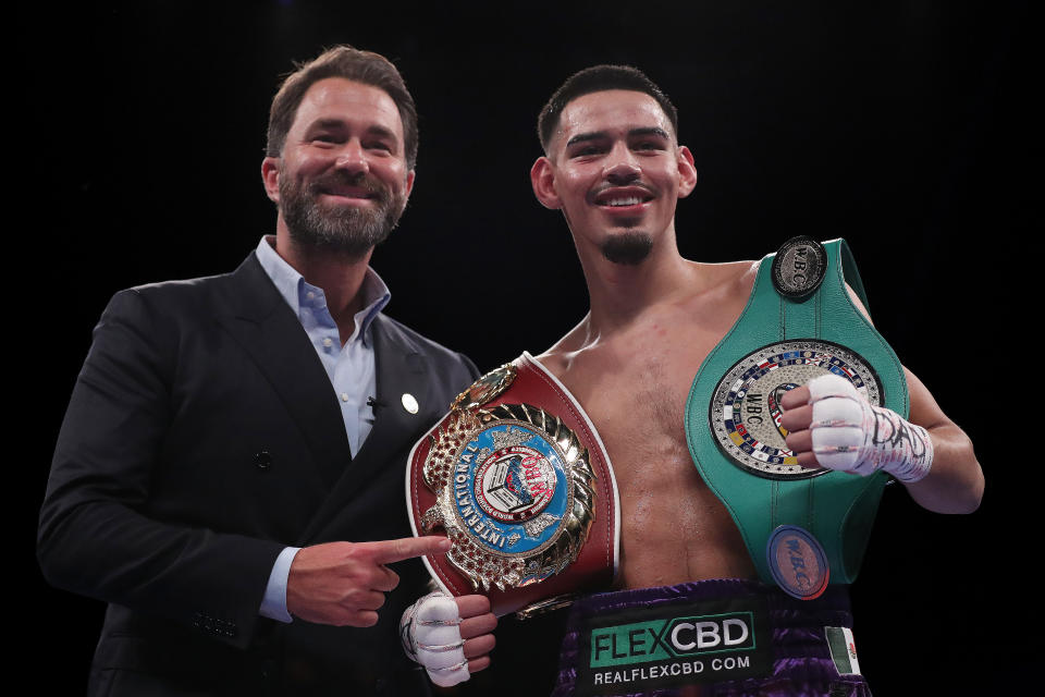 LIVERPOOL, ENGLAND - MARCH 11: Eddie Hearn, Chairman of Matchroom Sport, poses for a photograph with Diego Pacheco and their Title Belts after defeating Jack Cullen during the WBO International Super Middle Title fight between Diego Pacheco and Jack Cullen at M&S Bank Arena on March 11, 2023 in Liverpool, England. (Photo by Lewis Storey/Getty Images)