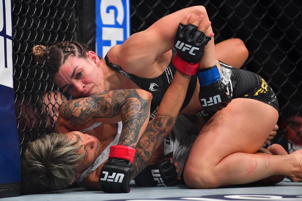 Feb 17, 2024; Anaheim, California, USA; Mackenzie Dern pins Amanda Lemos to the mat during UFC 298 at Honda Center. Mandatory Credit: Gary A. Vasquez-USA TODAY Sports